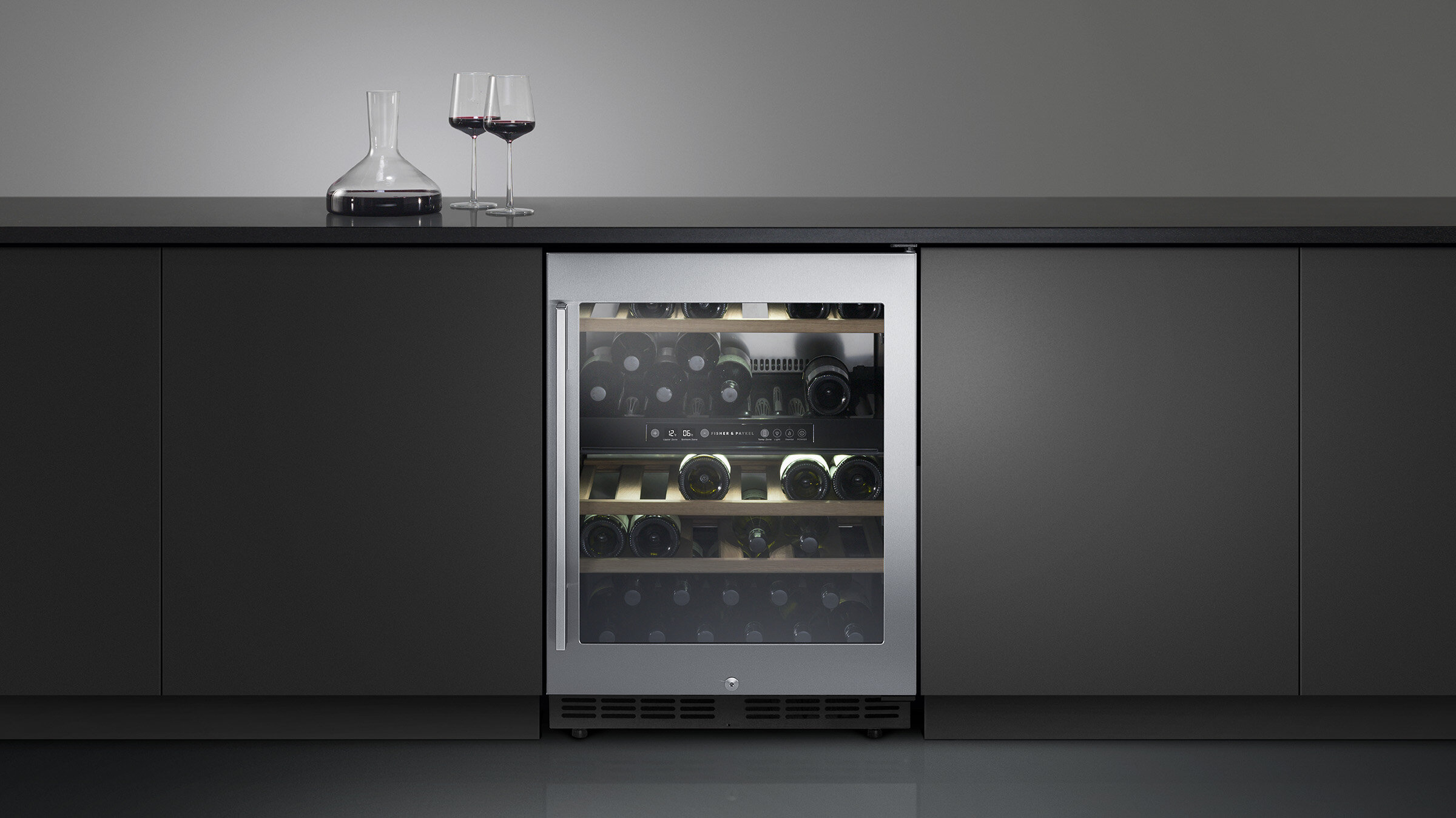 Silver Contemporary Style Wine Column Set into Black Cabinetry.