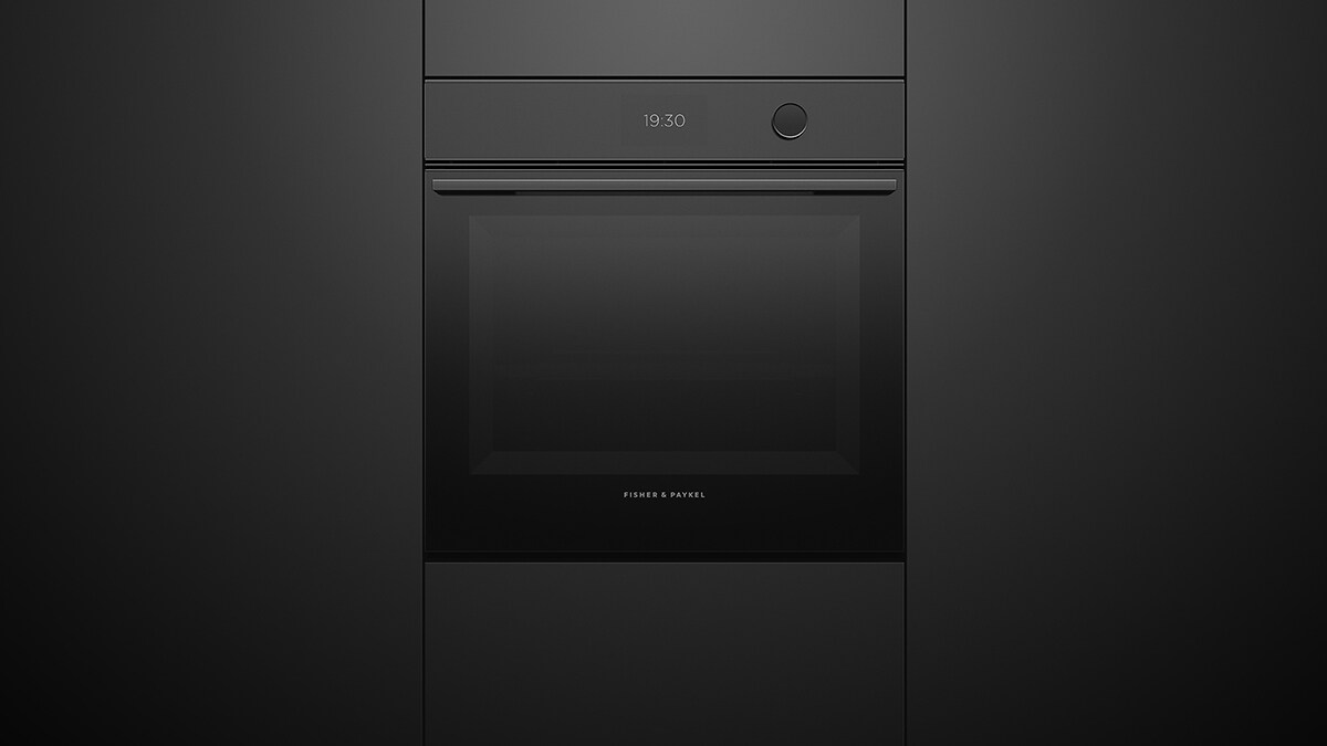 Built-in Convection Oven Set into Black Cabinetry.