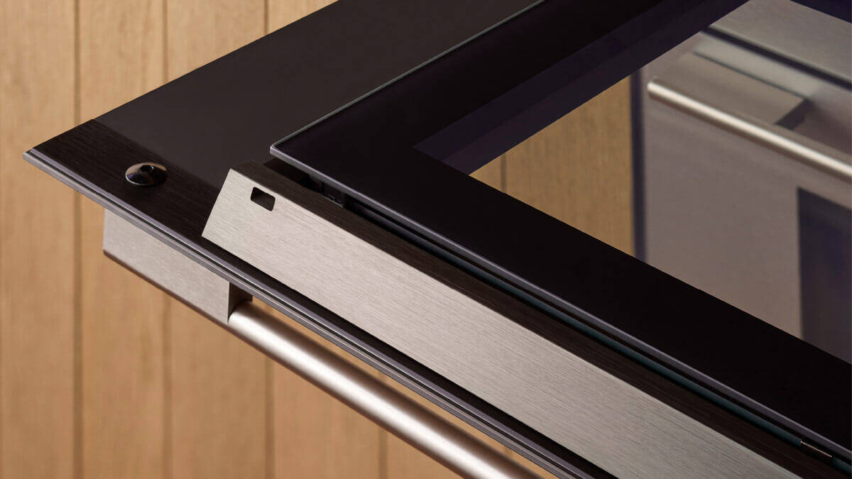 Precision-engineered drawer rails and reinforced hinges under testing conditions