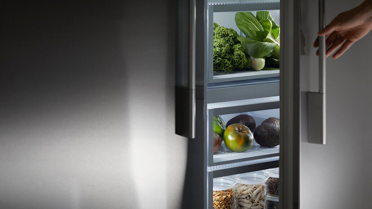 Detail of the temperature management system and fan shroud inside a Fisher & Paykel refrigerator