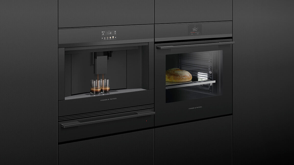 Matching stainless steel finishes across oven, drawer and coffee appliances