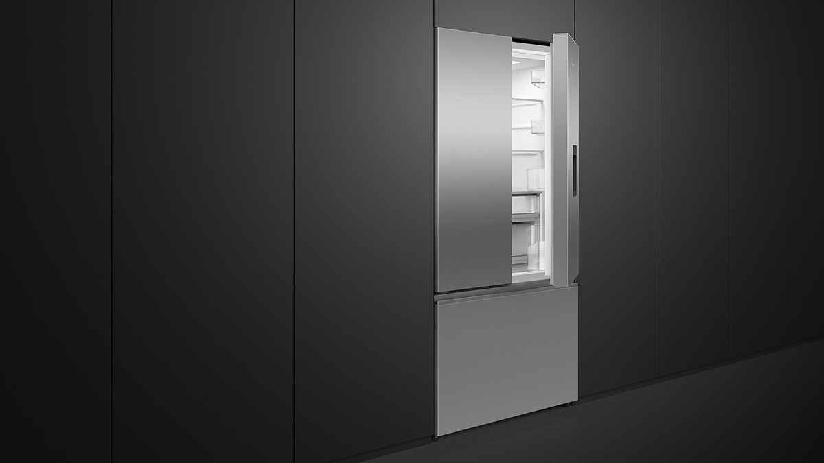 Integrated French door refrigerator seamlessly fitted into custom cabinetry