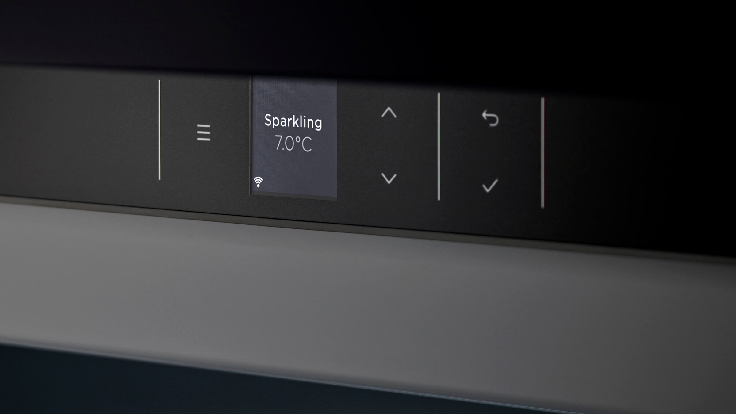 Fresh greens and vegetables stored in a specialized humidity-controlled refrigerator drawer