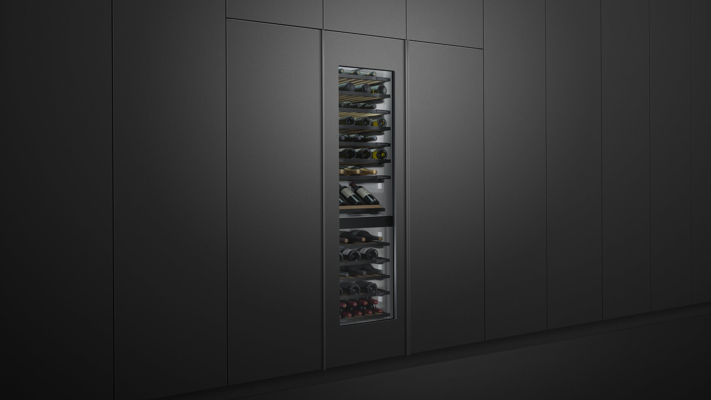 Wine column integrated into black cabinetry