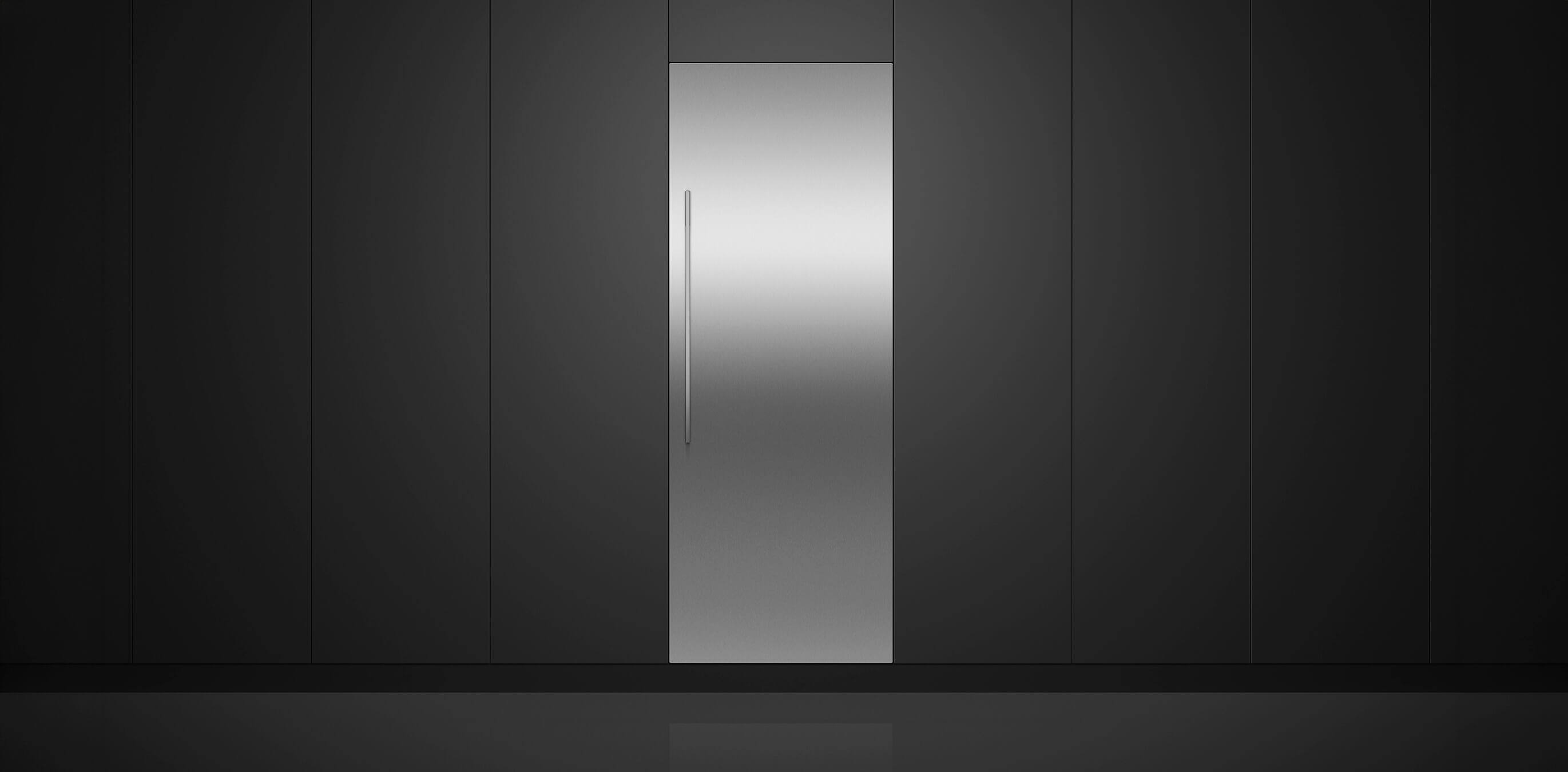 Stainless steel vertical refrigerator columns built into sleek black cabinetry