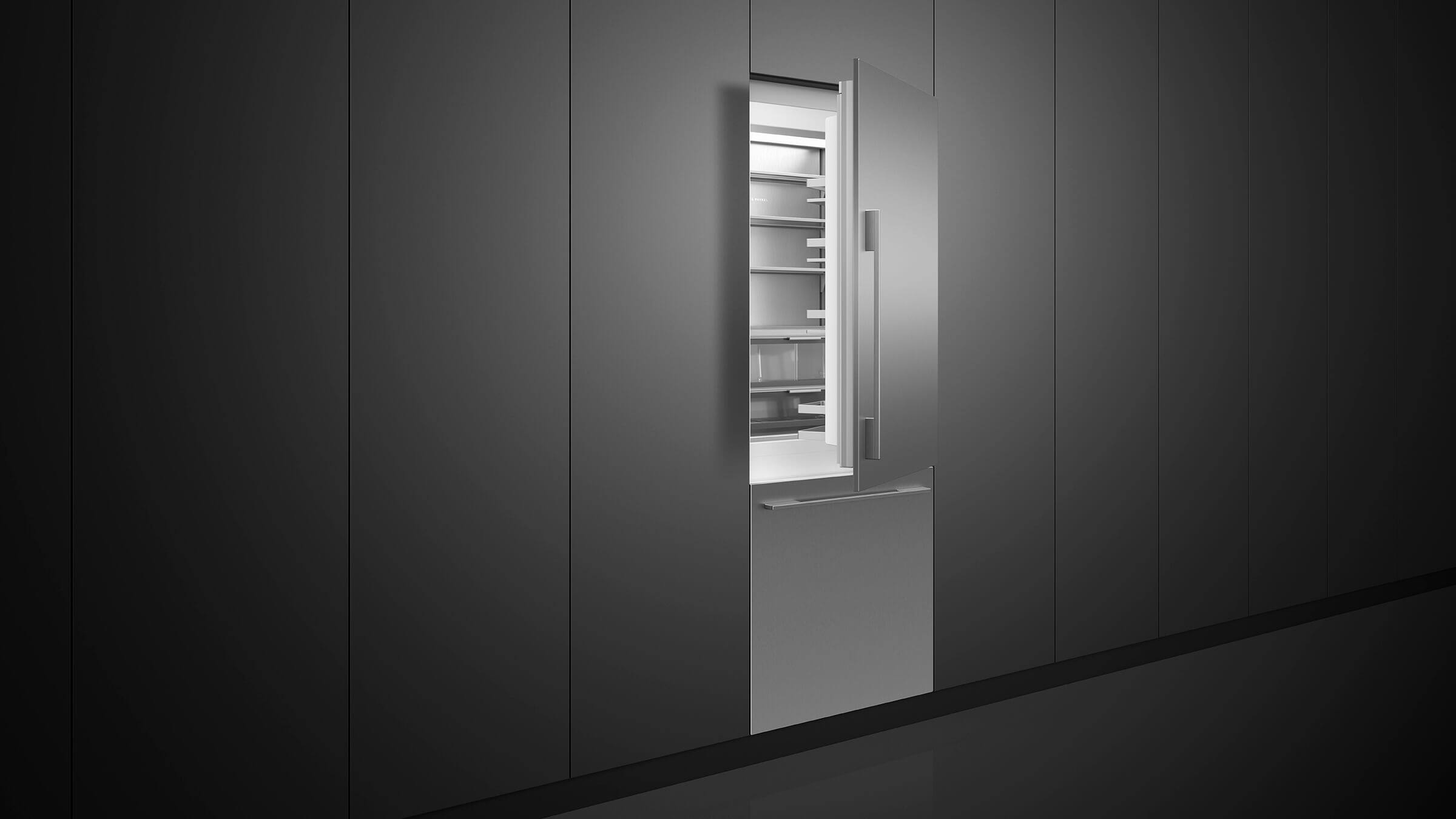 An integrated vertical refrigerator column blends seamlessly with kitchen cabinetry