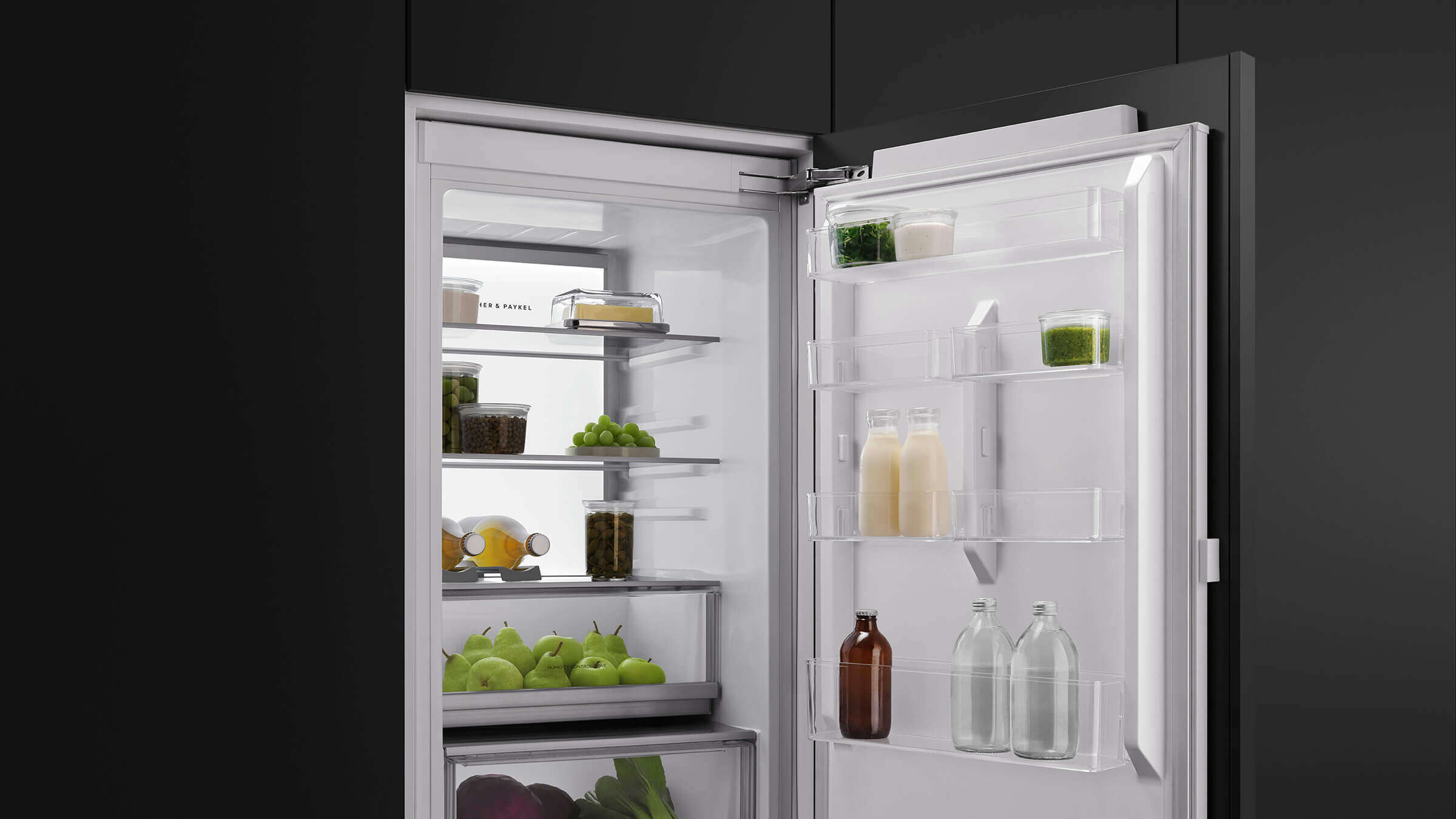 Interior view of an integrated refrigerator showing airflow vents for ActiveSmart technology