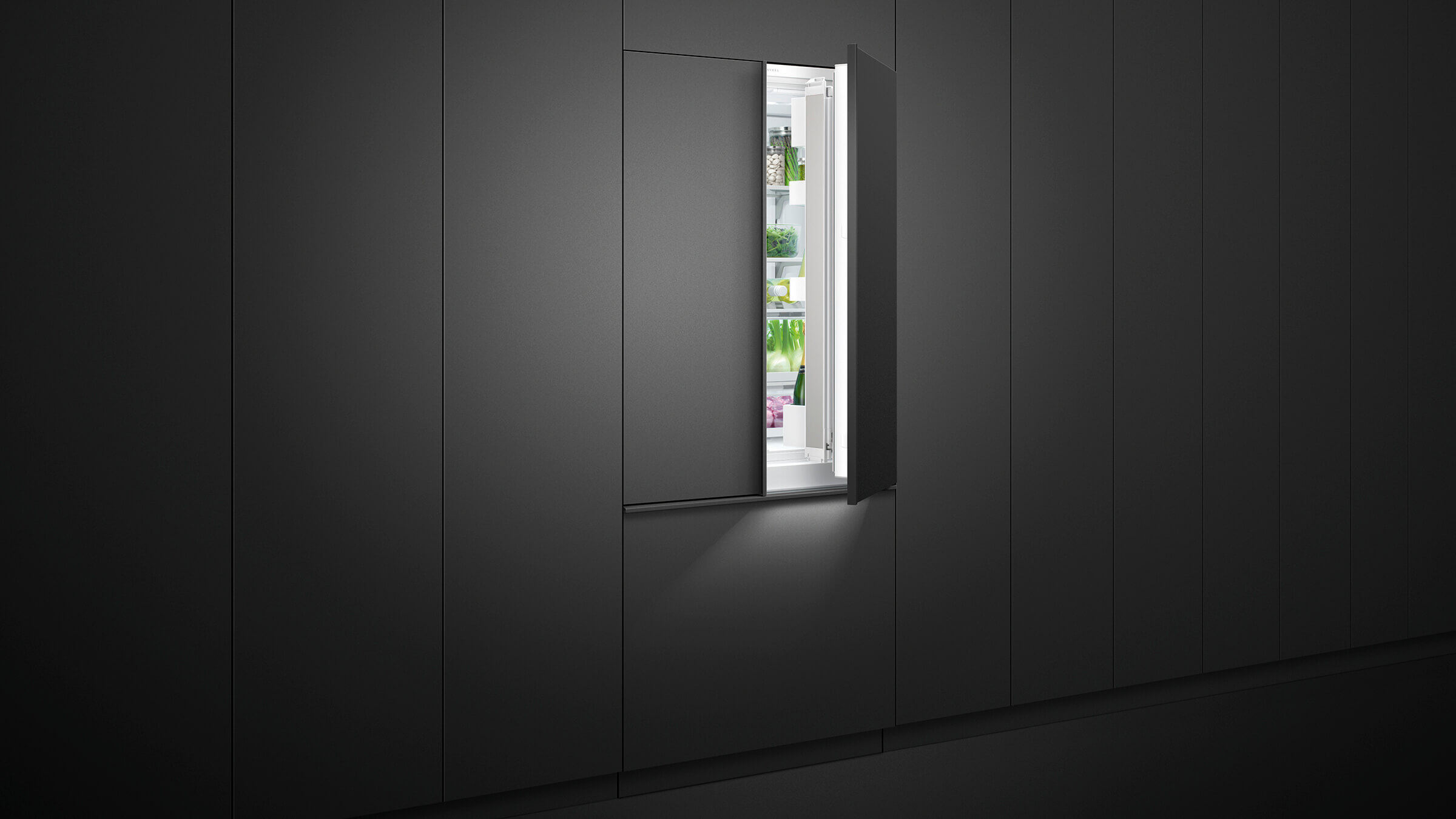 Integrated French Door refrigerator columns seamlessly fitted into custom kitchen cabinetry