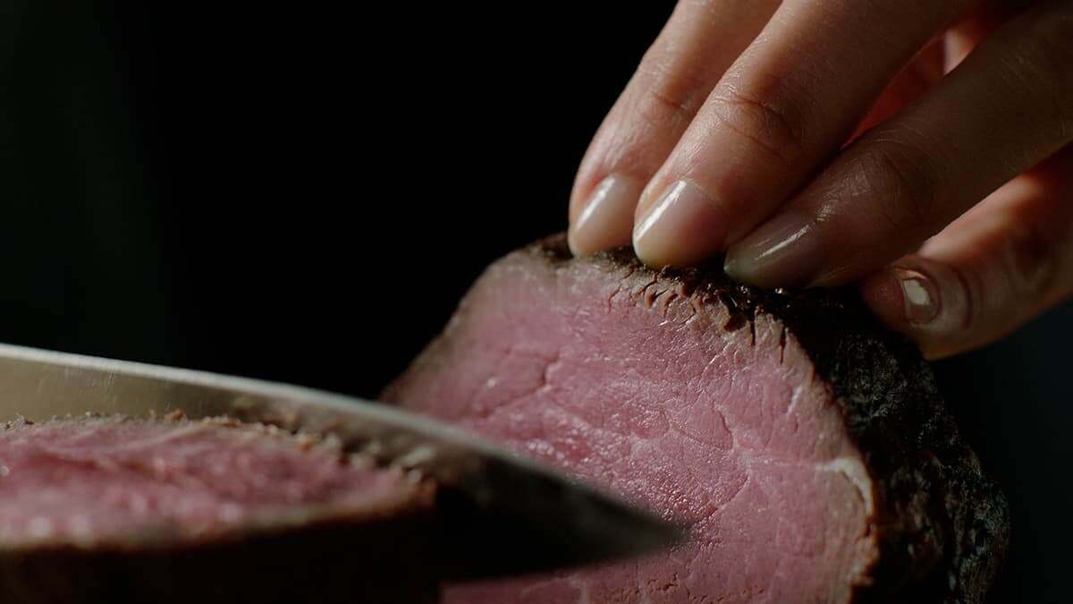 Companion appliances installed beneath a cooktop, supporting coordinated cooking performance