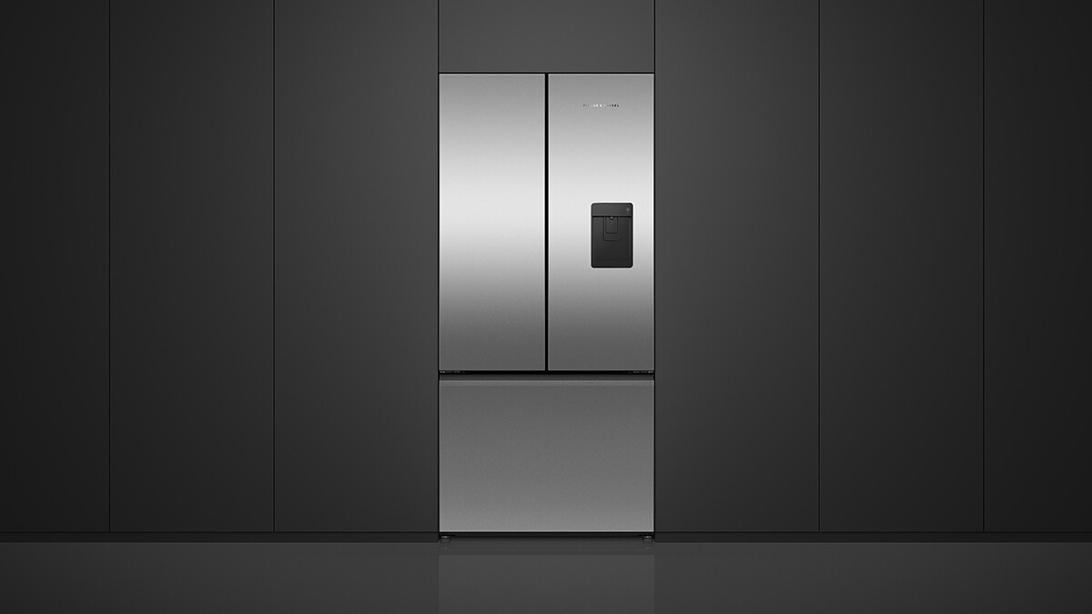 Silver Freestanding Refrigeration Set into Black Cabinetry.